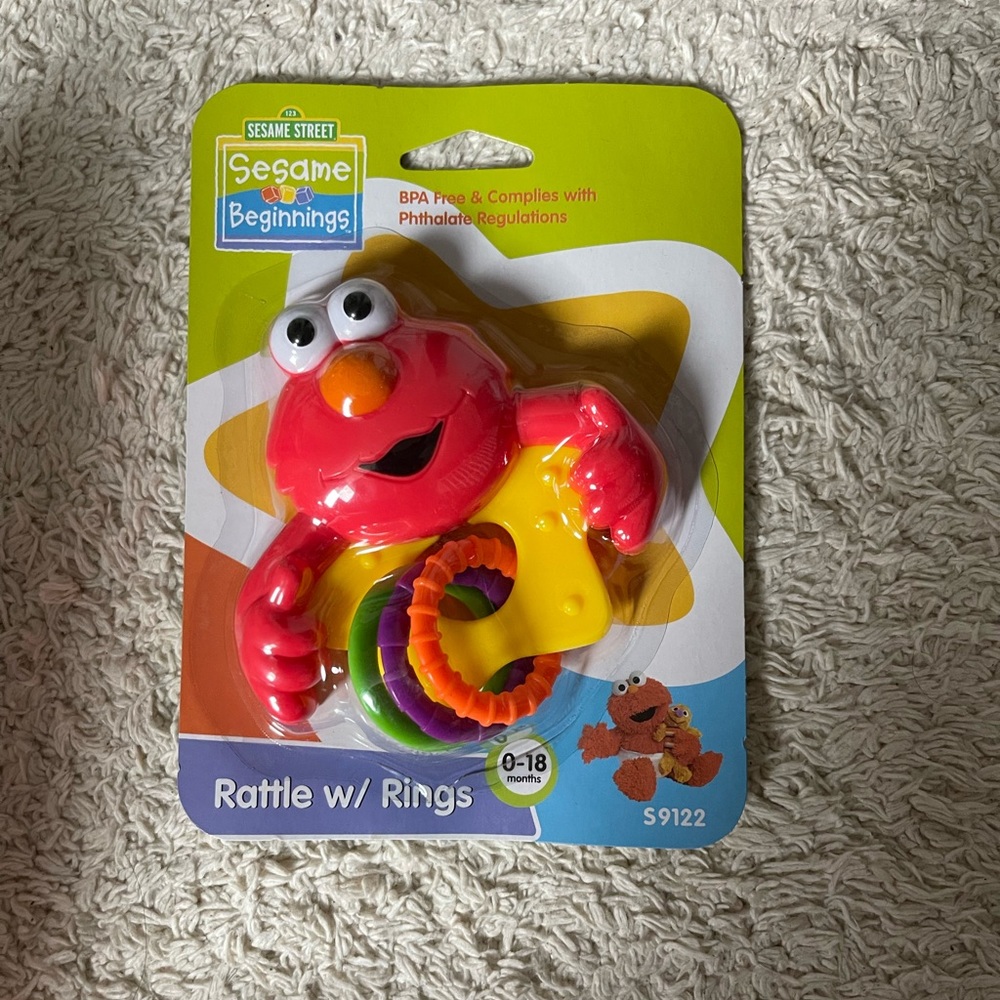 Sesame Street Elmo rattle with rings